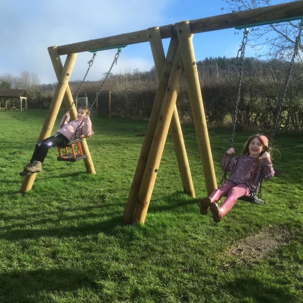 Kids on the playground swing